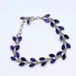 Long silver bracelet with natural amethysts