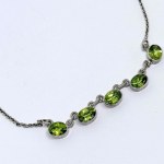 Silver necklace with natural peridots