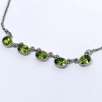 Silver necklace with natural peridots