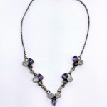 Patinated silver necklace with natural amethysts, moonstones, and quartz