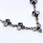 Patinated silver necklace with natural amethysts, moonstones, and quartz