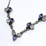 Patinated silver necklace with natural amethysts, moonstones, and quartz