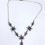 Silver floral necklace with natural amethysts
