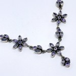 Silver floral necklace with natural amethysts