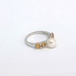 Silver ring with an Akoya pearl and natural citrines