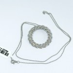 An interesting silver necklace with white topaz