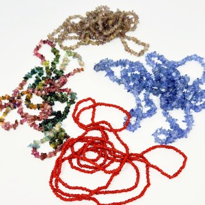 Four necklaces made of natural stones