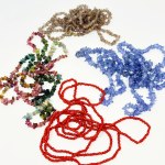 Four necklaces made of natural stones