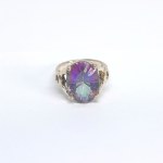 Silver ring with a large mystic topaz