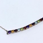 Silver necklace with natural garnets, peridots, citrines, topazes, and amethysts