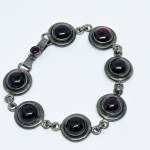 Silver bracelet with large natural rubies