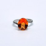 Silver ring with a large and small Padparadscha topaz