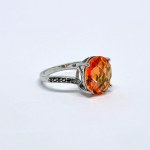 Silver ring with a large and small Padparadscha topaz