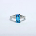 Silver ring with a rectangular Sky Blue topaz