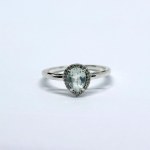 Silver ring with natural prasiolite and white topaz