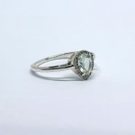 Silver ring with natural prasiolite and white topaz