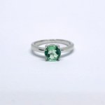 Silver ring with a natural green sapphire