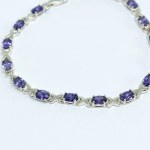 Silver bracelet with purple stones