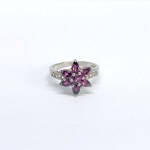 Silver ring with natural garnets and white topazes