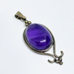 Silver pendant with a large cabochon amethyst