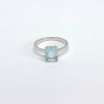 Silver ring with a natural topaz