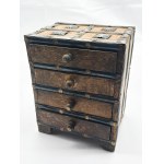 An old wooden box with metal fittings, 17th century (?)