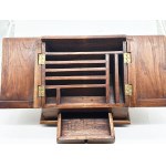An old wooden desk letter tray