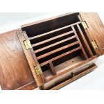 An old wooden desk letter tray