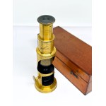 Antique brass field microscope in a box, circa 1910