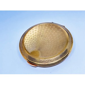 Gold-plated compact with a mirror