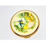 Gold-plated compact with a picture
