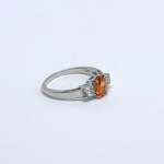 Silver ring with natural orange and white topaz stones