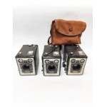 Three Kodak Brownie cameras (2 Model E, 1 Model D), one in a case
