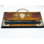 Wooden, metal-rimmed desk stand