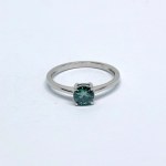 Silver ring with a 1.0 Ct green moissanite