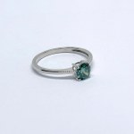Silver ring with a 1.0 Ct green moissanite
