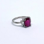 Silver Ring with a Natural Ruby and White Sapphires