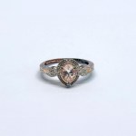 Silver ring with a patina finish and an illusion effect, featuring a natural kunzite (?) and 0.06 Ct diamonds