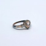 Silver ring with a patina finish and an illusion effect, featuring a natural kunzite (?) and 0.06 Ct diamonds