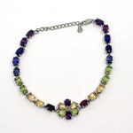 Silver bracelet with natural garnets, peridots, citrines, amethysts, and iolites