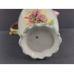 A pitcher in the style of Bonn Manufactory products
