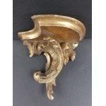 Baroque wall shelf with a floral motif