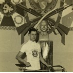Photograph - Shooting Association Champion, 1936–37. Poznań [cyclist, banner, bust of Piłsudski]
