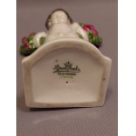 Rosenthal Porcelain: Putto Figurine with Bouquets of Roses, 1927