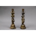 A pair of metal candlesticks, 20th century