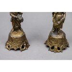 A pair of metal candlesticks, 20th century
