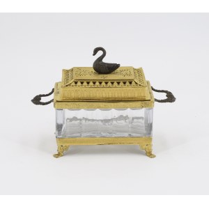 A box with a swan figurine