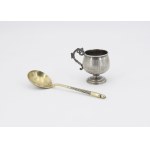 A cup and a spoon