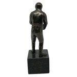 Figur eines Mannes, der Bowling spielt