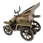 Silver replica of the first Fiat 4 HP model
